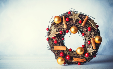 Rustic Christmas wreath with decorationsの写真素材