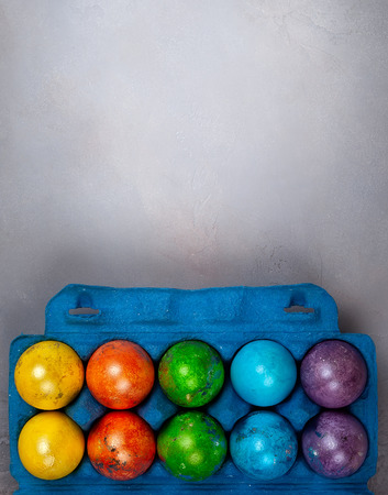Easter concept wit colorful Easter eggs on greyの写真素材