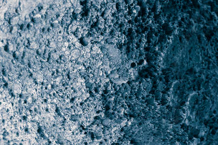 Abstract planet or meteorite surface with uneven relief. Asteroid or moon background imitation.