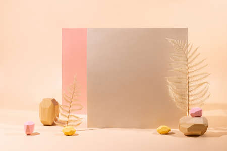 Paper sheets, wooden stones and dried leaves