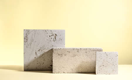 Abstract modern still life. Natural materials. Composition of travertine and concrete blocks.の写真素材