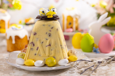 Traditional Easter Cottage Cheese Dessert for Orthodox Easter. Festive table with Easter treats and decorations for holiday.の写真素材