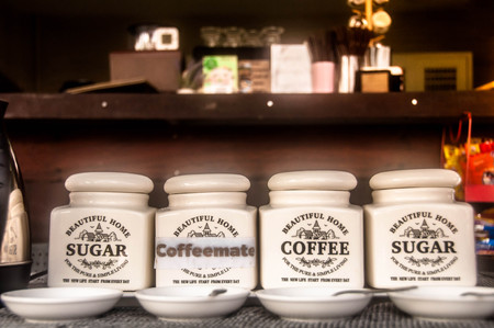 Set of Morning coffee,sugar,coffee mate,sugar,on the wooden table.の写真素材