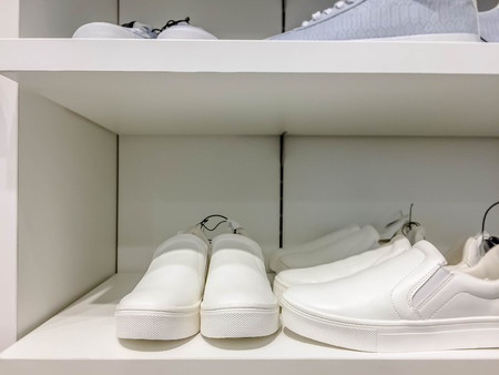 White Sneaker on the white shelfの写真素材