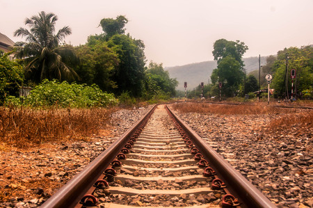 old straight railway and small stone at station.の写真素材