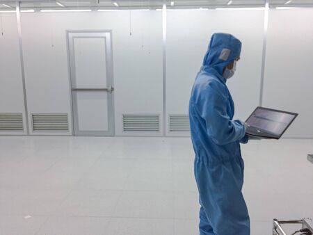 Blurred engineer Inside Clean room class 1000 with emergency door at factory,empty roomの写真素材