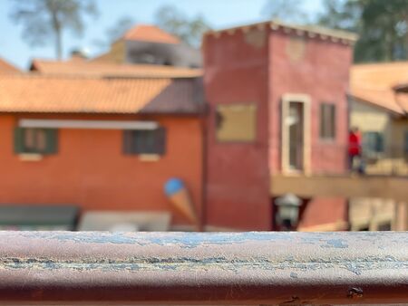 Empty old rough bar with blurred Italy house background.の写真素材