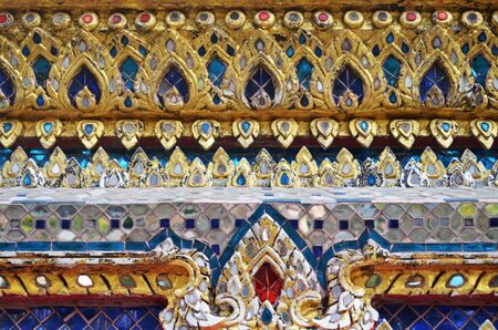 beautiful decorations on the thai temple wall in bangkokの写真素材