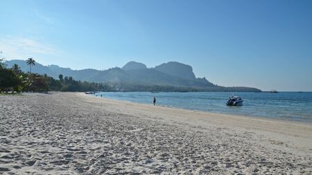 ko mook island beach and long pier going into the ocean, thailandの写真素材