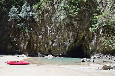 canoes on the beach of emerald cave in ko mook island, thailandのeditorial素材