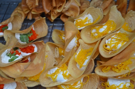 delicious thai sweet crisp tart khanom buang on a street marketの写真素材