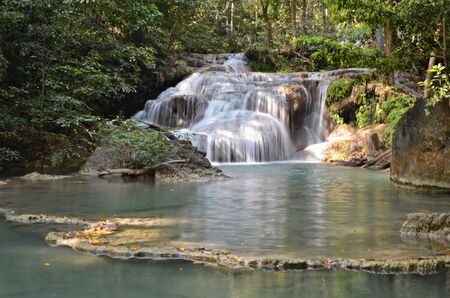 waterfall in Erawan Waterfalls National Park in Thailandの写真素材