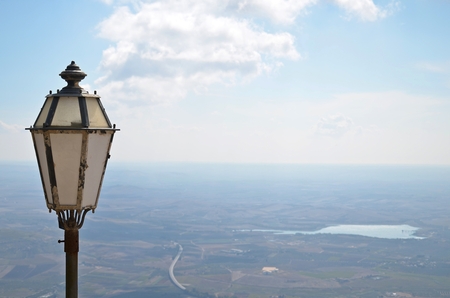 lamp close up and the sicilian inland and sky on the backgroundの写真素材