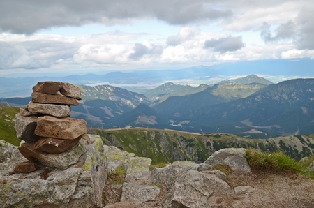 Beautiful view of Tatra mountains witch stack of rocks and clouds on the sky.の写真素材