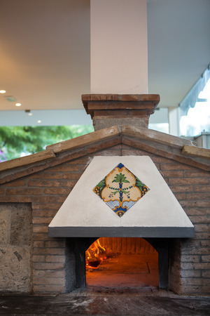 A traditional oven for cooking and baking pizza.のeditorial素材