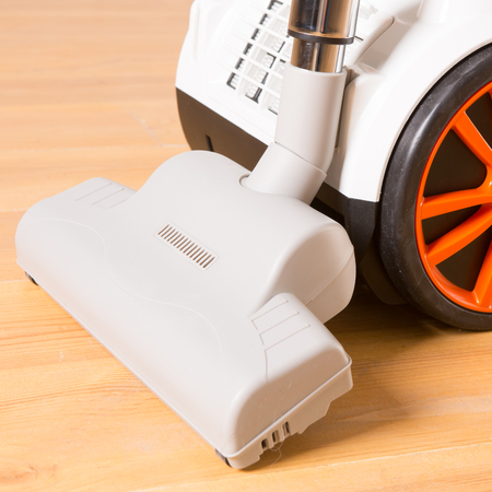 vacuum cleaner stands in the home  livingroomの写真素材