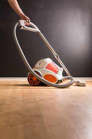 man who cleans the floor of the houseの写真素材