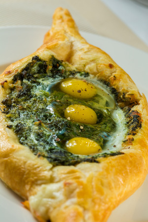 close up adjarian khachapuri at restaurantの写真素材