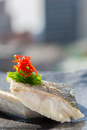 steamed organic fish fillet at restaurantの写真素材