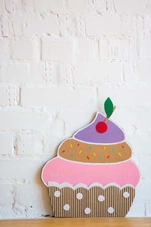 colored cakes handmade ââof paper on white backgroundの写真素材