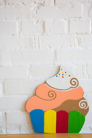 colored cakes handmade ââof paper on white backgroundの写真素材