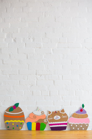 colored cakes handmade ââof paper on white backgroundの写真素材