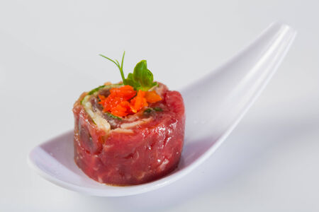 tasty appetizer. Beef carpaccio with salad leaves and vegetabales. Close upの写真素材