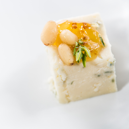 Appetizer. Blue cheese with nuts. Creative cuisine. close-upの写真素材