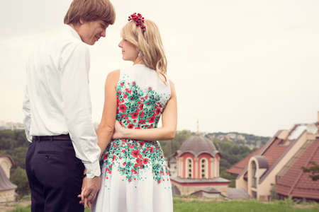 Beautiful wedding couple is enjoying wedding in the sun.の写真素材