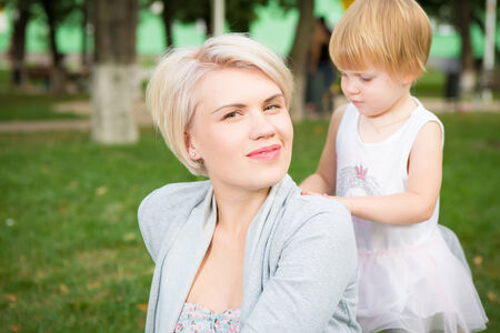 portrait of beautiful mother and kid girlの写真素材