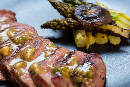 Duck breast on orange sauce with vegetable. Japanese cuisine. selective focusの写真素材