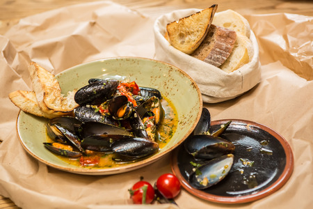 Moules Marinieres. Mussels cooked with white wine sauce. Shallow dof.の写真素材