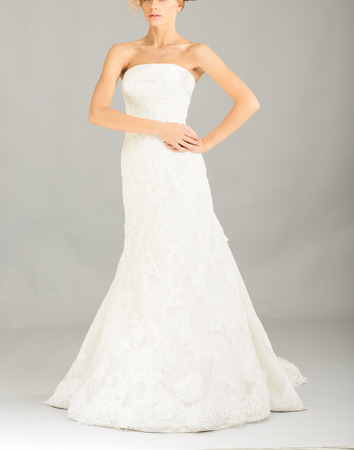 Beautiful bride on grey background. Studio shotの写真素材