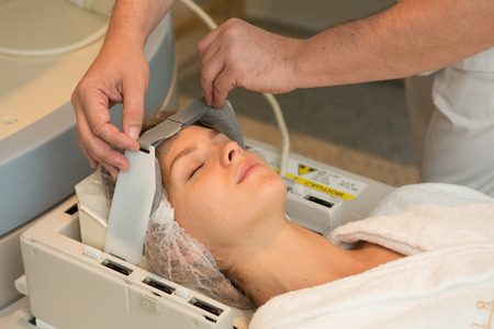 doctor examining woman at Magnetic resonance imagingの写真素材