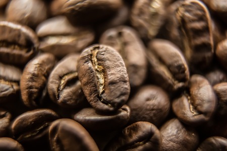 closeup of brown roasted coffee backgroundの写真素材