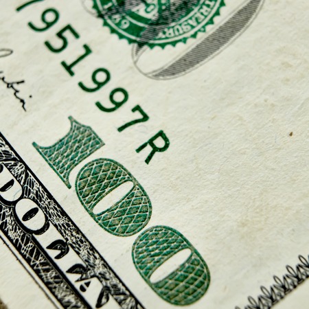 Macro close up of the US 100 dollar bill. Extreme macro. Shallow dof