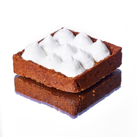 Sweet tartlets filled with cream. With copy spaceの写真素材