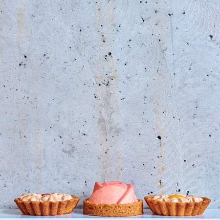 Sweet tartlets filled with cream. の写真素材