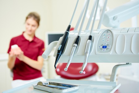Portrait of happy female dentist in clinicの写真素材