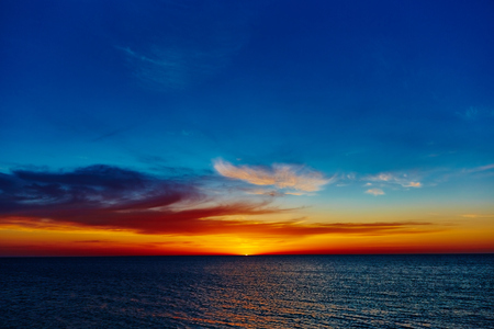 Sunset over the ocean. sunset at coast of the seaの写真素材