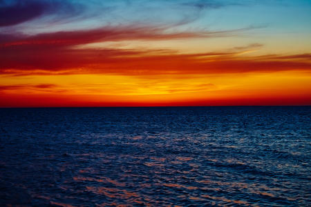 Sunset over the ocean. sunset at coast of the seaの写真素材
