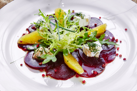 salad of roasted red beets and feta cheese with olive oilの写真素材