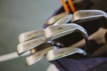 Dirty golf clubs in bag. Shallow dofの写真素材