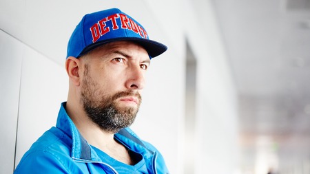 Profile of a handsome man wearing a cap