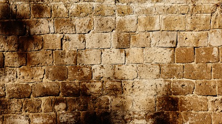 Background of old stone wall texture photoの写真素材