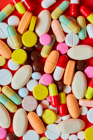 Close up of many colorful pills. Top view with copy space. Medicine conceptの写真素材