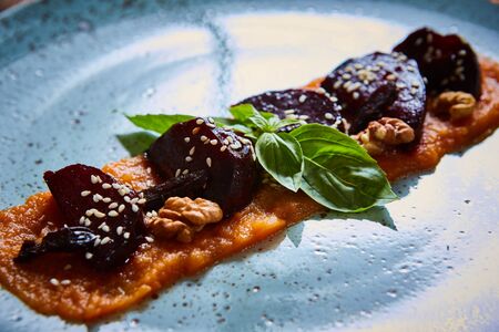 roasted vegetables: beets with pumpkin puree. Shallow dofの写真素材