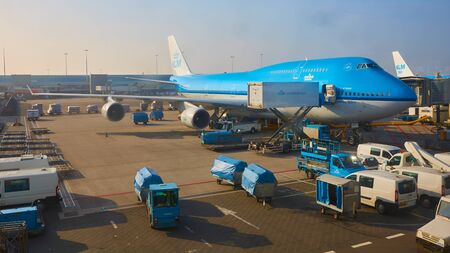 Amsterdam, Netherlands - March 11, 2016: KLM plane being loaded at Schiphol Airportのeditorial素材