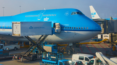Amsterdam, Netherlands - March 11, 2016: KLM plane being loaded at Schiphol Airportのeditorial素材