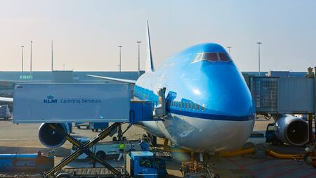 Amsterdam, Netherlands - March 11, 2016: KLM plane being loaded at Schiphol Airportのeditorial素材